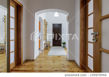 Apartment Corridor Interior with Wooden Doors and Arch Apartment Corridor Interior with Wooden Doors and Arch 140978948
