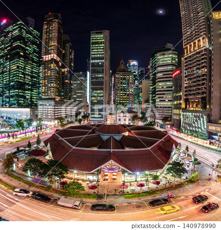 A panoramic night view of Lau Pa Sat, a historic hawker center standing in Singapore's financial district. A panoramic night view of Lau Pa Sat, a historic hawker center standing in Singapore's financial district. 140978990