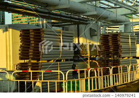 Close-up of the pile of material of metal scaffolding for work. Construction concept. Construction equipment. Close-up of the pile of material of metal scaffolding for work. Construction concept. Construction equipment. 140979241