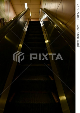 Close-up of the escalator. escalator convergence line. Indoor view. Close-up of the escalator. escalator convergence line. Indoor view. 140979276