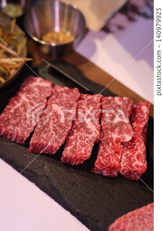 Premium Wagyu Beef Slices on Slate Plate 140979925