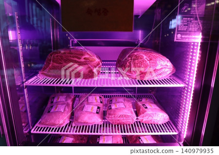 Purple Lit Meat Display in Refrigerator Purple Lit Meat Display in Refrigerator 140979935