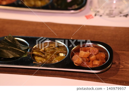 Three Compartment Food Tray with Various Dishes 140979937
