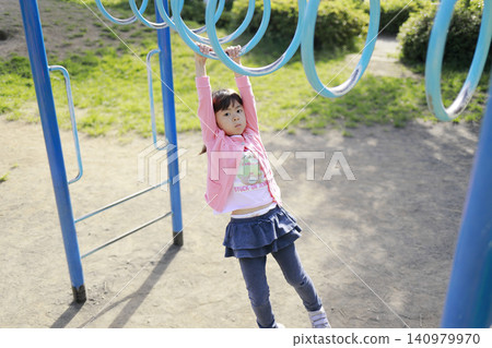 Infant (5-year-old) playing on a cloud ladder 140979970