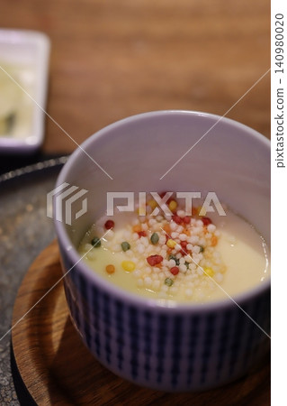 Bowl of Creamy Grains with Colorful Additions Bowl of Creamy Grains with Colorful Additions 140980020