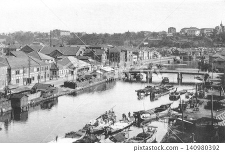 Old photograph, 1918-1933, Yokohama, Yoshihama Bridge viewed from Hanazono Bridge over the Ooka River. Old photograph, 1918-1933, Yokohama, Yoshihama Bridge viewed from Hanazono Bridge over the Ooka River. 140980392