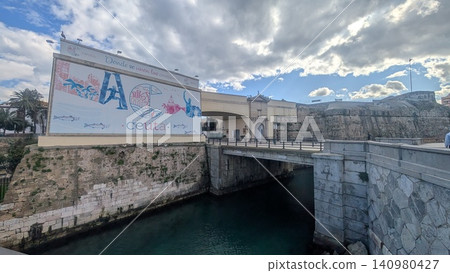View of a bridge over a canal at the fortification and a wall mural 140980427