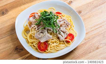 Cold pasta with pork shabu-shabu and perilla leaves: A refreshing Japanese-style spaghetti that's popular in summer. Cold pasta with pork shabu-shabu and perilla leaves: A refreshing Japanese-style spaghetti that's popular in summer. 140981423