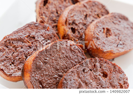 Homemade, delicious chocolate rusks placed on a white plate for a photo shoot (06) Homemade, delicious chocolate rusks placed on a white plate for a photo shoot (06) 140982007