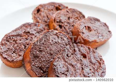 Homemade, delicious chocolate rusks placed on a white plate for a photo shoot (09) Homemade, delicious chocolate rusks placed on a white plate for a photo shoot (09) 140982010