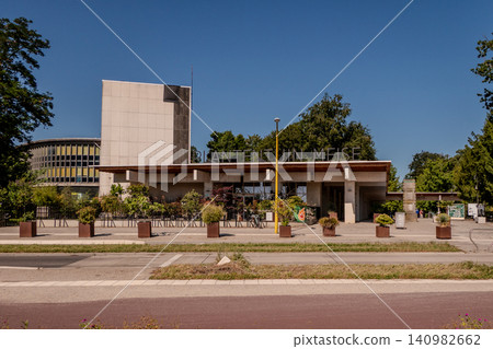 Meise Botanic Garden entrance pavilion building under blue sky, Belgium 140982662