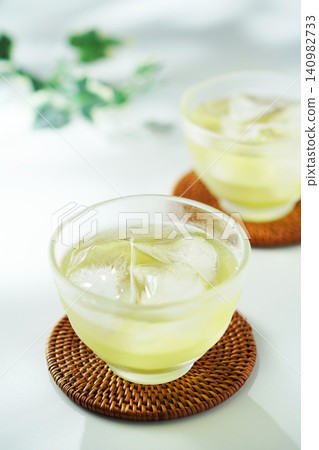 Cold green tea on a summer day Cold green tea on a summer day 140982733