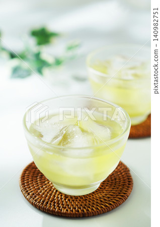 Cold green tea on a summer day Cold green tea on a summer day 140982751