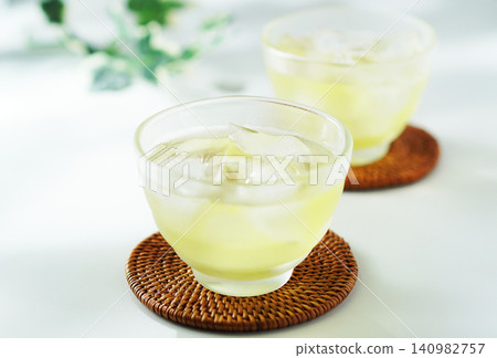 Cold green tea on a summer day Cold green tea on a summer day 140982757