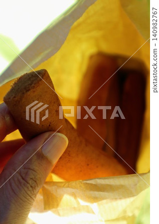 Poppo-yaki (a type of Japanese sweet) - person Poppo-yaki (a type of Japanese sweet) - person 140982767