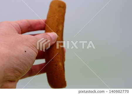 Poppo-yaki (a type of Japanese sweet) - person Poppo-yaki (a type of Japanese sweet) - person 140982770