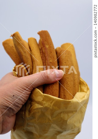 Poppo-yaki (a type of Japanese sweet) - person Poppo-yaki (a type of Japanese sweet) - person 140982772