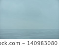 Background material of a hazy sea and sky; a rainy day sea; a bleak, abstract background. Background material of a hazy sea and sky; a rainy day sea; a bleak, abstract background. 140983080
