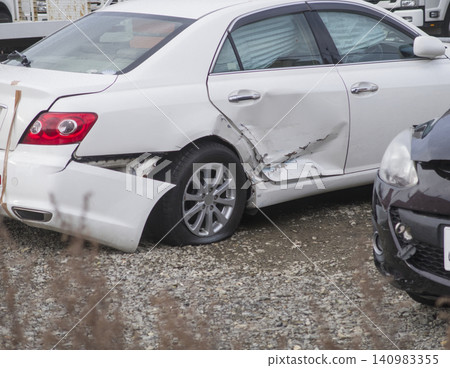 Car damaged in an accident 140983355