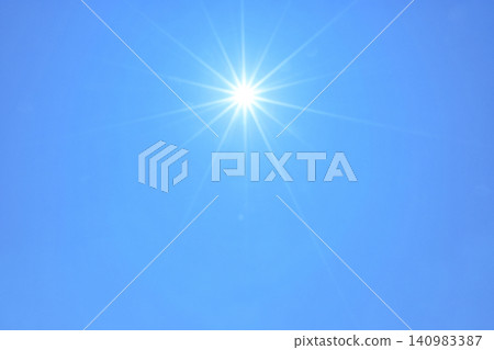 Blue sky and sun, direct sunlight, free space image Blue sky and sun, direct sunlight, free space image 140983387