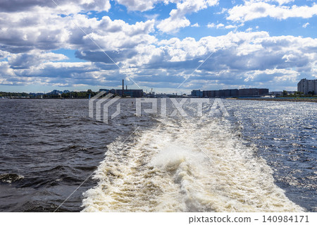 trail left in water of Neva River by moving boat trail left in water of Neva River by moving boat 140984171