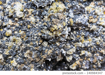sphalerite, pyrite, chalcopyrite rock surface sphalerite, pyrite, chalcopyrite rock surface 140984347