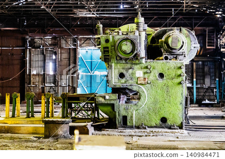 old industrial equipment in abandoned workshop old industrial equipment in abandoned workshop 140984471