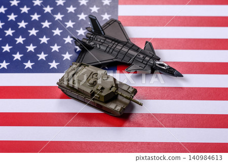 A fighter jet against the US flag as a conceptual background representing defense A fighter jet against the US flag as a conceptual background representing defense 140984613