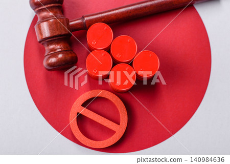 The cargo container ban on the Japanese flag as a conceptual backdrop . The cargo container embargo The cargo container ban on the Japanese flag as a conceptual backdrop . The cargo container embargo 140984636