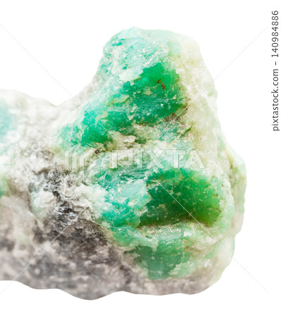 unworked emerald crystals on quartz rock close-up unworked emerald crystals on quartz rock close-up 140984886