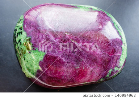 anyolite, ruby in zoisite rock close-up on black anyolite, ruby in zoisite rock close-up on black 140984968