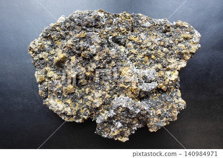 raw sphalerite, pyrite, chalcopyrite rock on black raw sphalerite, pyrite, chalcopyrite rock on black 140984971