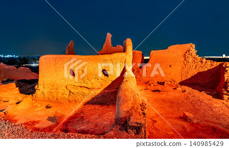 Illuminated ancient mud brick ruins of the At Turaif World Heritage Site at night in Diriyah, Saudi Arabia Illuminated ancient mud brick ruins of the At Turaif World Heritage Site at night in Diriyah, Saudi Arabia 140985429