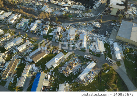 Destroyed by hurricane Ian suburban houses in Florida mobile home residential area. Consequences of natural disaster Destroyed by hurricane Ian suburban houses in Florida mobile home residential area. Consequences of natural disaster 140985672