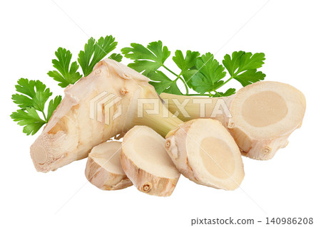 Fresh galangal root with slices isolated on white background with full depth of field. Fresh galangal root with slices isolated on white background with full depth of field. 140986208