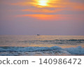 Stunning sunset over Indian Ocean on Hikkaduwa Beach Sri Lanka with calm waves 140986472