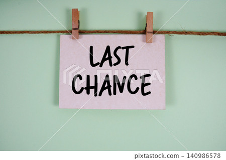Last Chance paper notes hanging on the rope with clothespins Last Chance paper notes hanging on the rope with clothespins 140986578