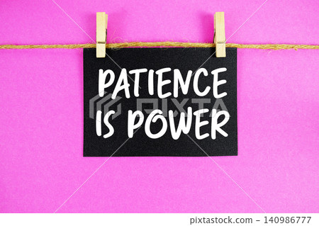 Patience Is Power paper notes hanging on the rope with clothespins Patience Is Power paper notes hanging on the rope with clothespins 140986777