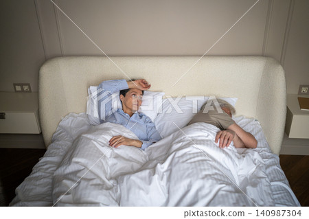 Senior married couple in relationship crisis, betrayed elderly wife looking at partner with doubt. Senior married couple in relationship crisis, betrayed elderly wife looking at partner with doubt. 140987304