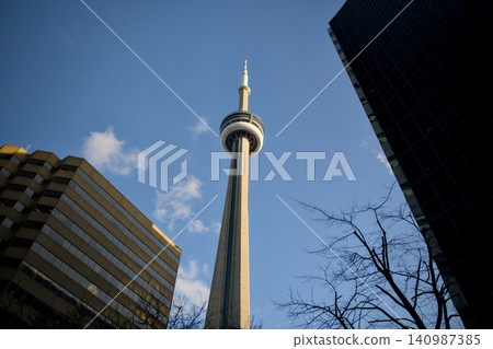 Landmark Tower Framed Between Contrasting City Buildings Landmark Tower Framed Between Contrasting City Buildings 140987385