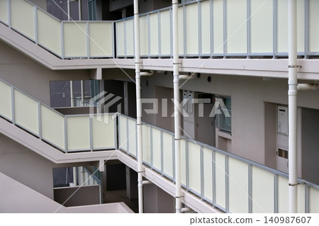 Image of an open corridor in a Tokyo Metropolitan Housing complex. Image of an open corridor in a Tokyo Metropolitan Housing complex. 140987607