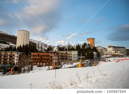 Sestriere, piedmont, italy. December 8, 2024. Sestriere ski resort town in piedmont, italy, featuring typical mountainous architecture and snowy slopes on a winter day Sestriere, piedmont, italy. December 8, 2024. Sestriere ski resort town in piedmont, italy, featuring typical mountainous architecture and snowy slopes on a winter day 140987894