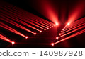Abstract red stage lighting beams forming diagonal lines, converging toward illuminated central pathway with vivid glow, strong contrast, deep shadow, cinematic atmosphere, modern dynamic 140987928