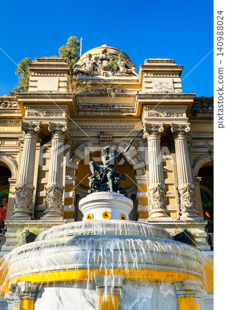 View of the ornate Neptune Fountain featuring a bronze statue and neoclassical architecture at Santa Lucia Hill in Santiago, Chile View of the ornate Neptune Fountain featuring a bronze statue and neoclassical architecture at Santa Lucia Hill in Santiago, Chile 140988024
