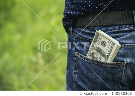 Hand holding loan money dollar bank note give financial payment. Man hands showing spread 100 dollar exchange cash payout. Saving Businessman counting money banknote  bribe corruption concept. 140988308