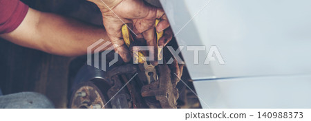 Banner Man hands fixing Car machinery vehicle mechanical service. Mechanic man hands repairing car shop. panoramaopen vehicle hood checking up auto mobile. Car maintenance engineer with copy sapce. 140988373