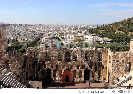 The Acropolis, a UNESCO World Heritage Site in Athens, Greece, and Europe, features a music hall and the city of Athens. The Acropolis, a UNESCO World Heritage Site in Athens, Greece, and Europe, features a music hall and the city of Athens. 140988830