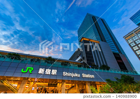 Tokyo, Shinjuku cityscape, evening view of Shinjuku Station South Exit Tokyo, Shinjuku cityscape, evening view of Shinjuku Station South Exit 140988900