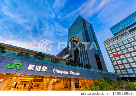 Tokyo, Shinjuku cityscape, evening view of Shinjuku Station South Exit 140988901
