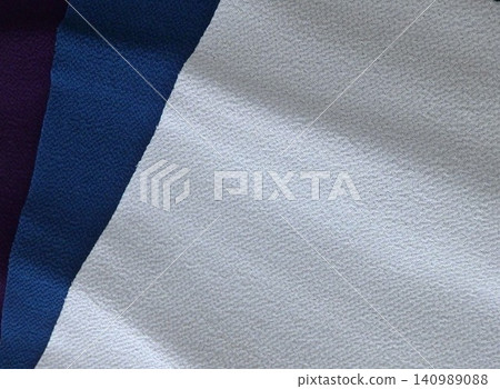 Wallpaper covered with indigo-dyed cloth Wallpaper covered with indigo-dyed cloth 140989088